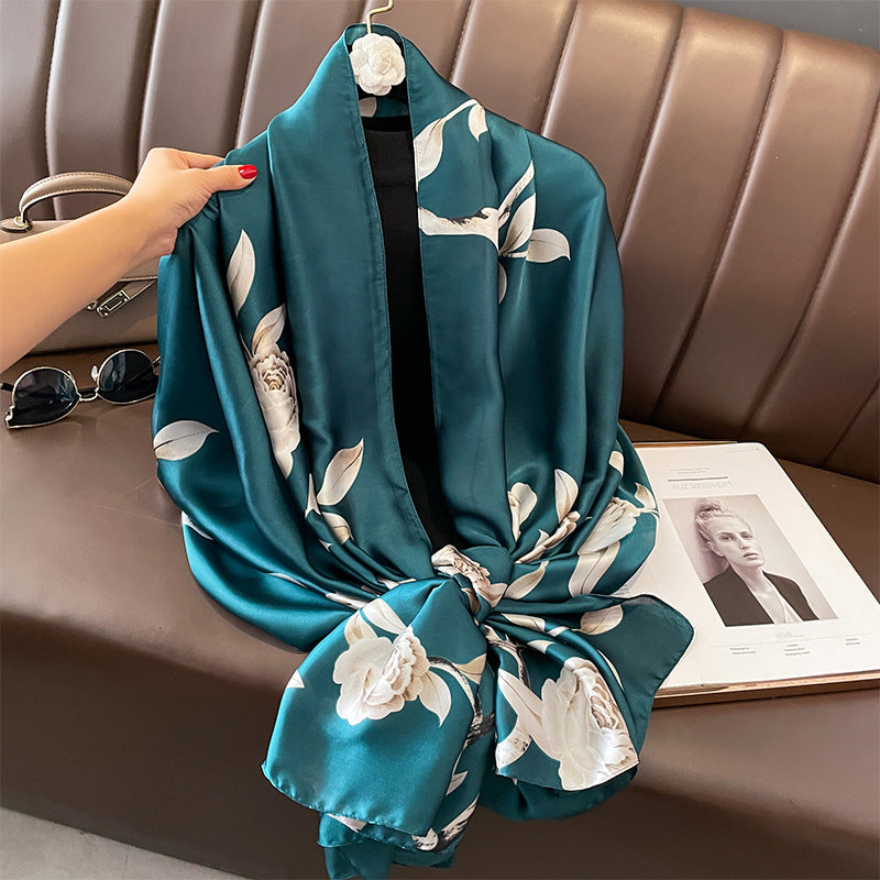 Deep teal silk-satin scarf with a large white rose and leaf floral pattern