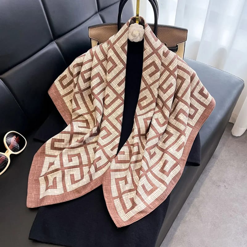 Dusty rose and cream geometric print silk-satin scarf with a bordered edge