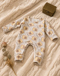 Cream baby romper with bear toast print