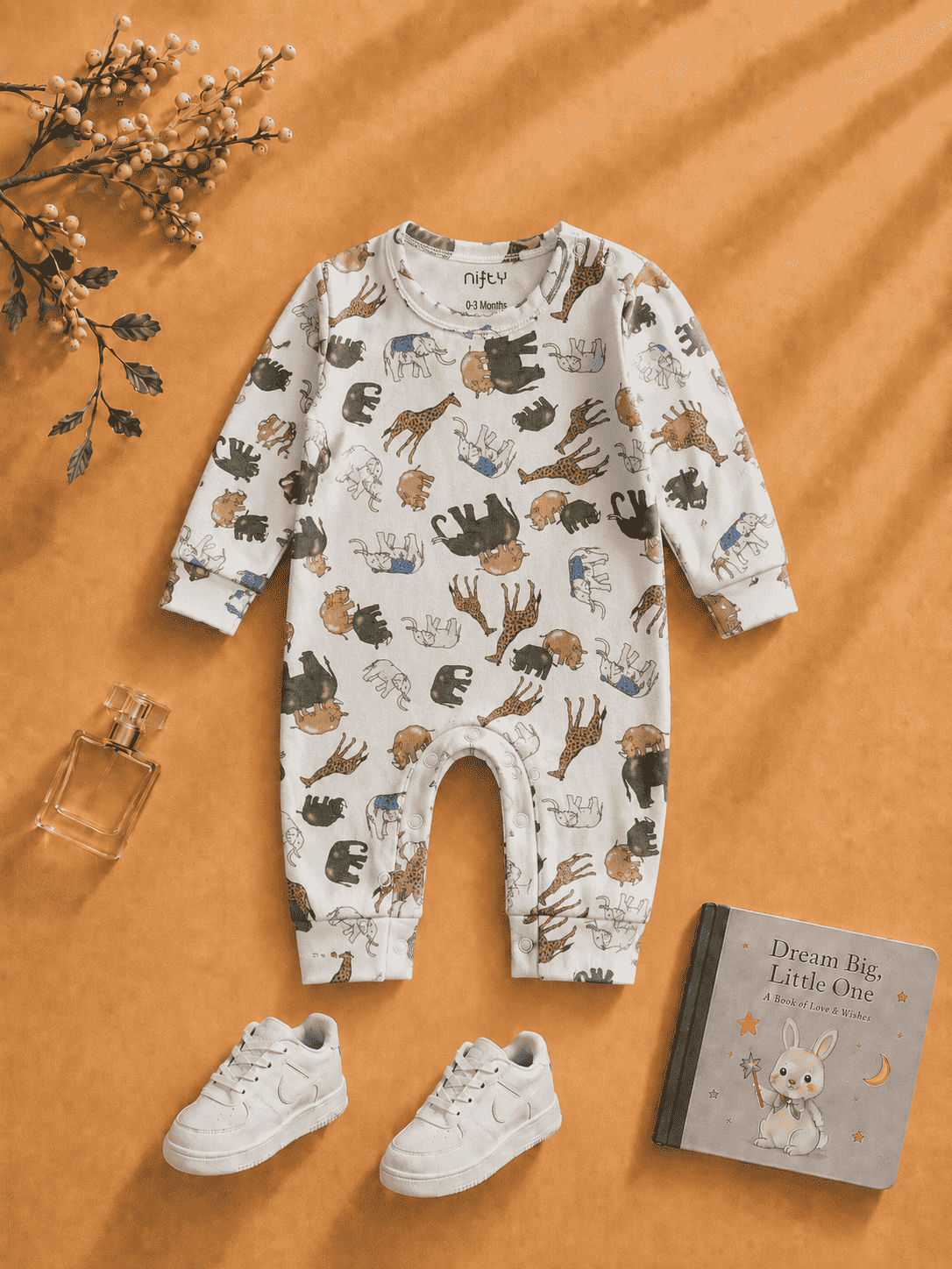 Cream baby romper with elephant giraffe print