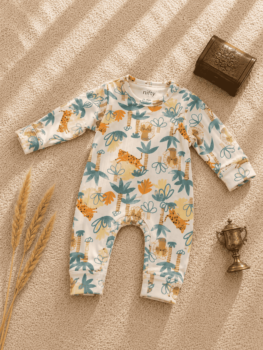 Cream baby romper with jungle animal print