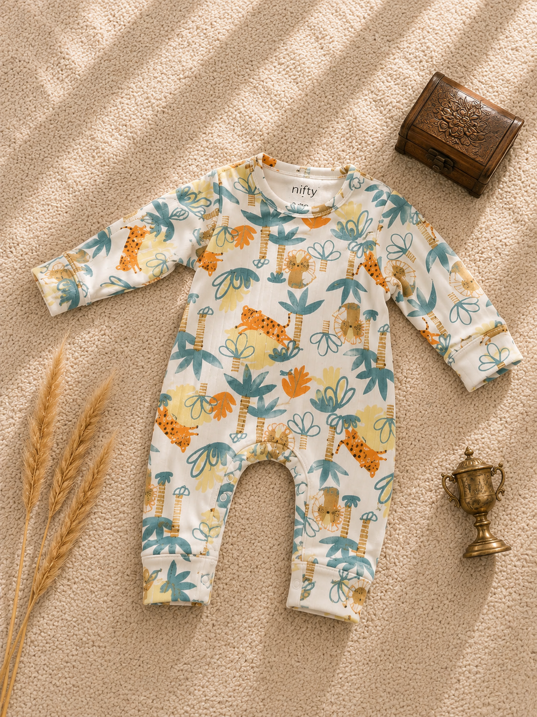Cream baby romper with jungle animal print