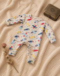 Beige baby romper with airplane print