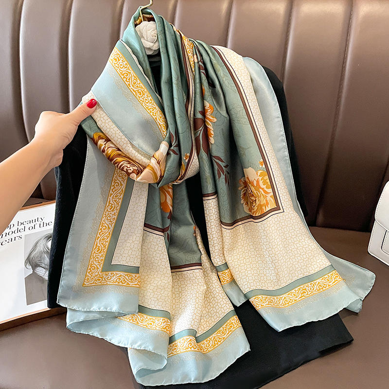 Sage green silk-satin scarf with yellow peony floral print and decorative cream border