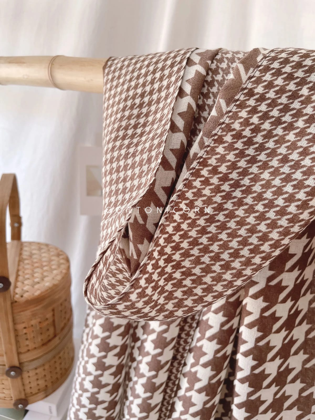 Brown and white silk-satin scarf featuring a large and small scale houndstooth pattern