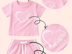 Pink girls outfit set with butterfly heart graphic t-shirt and matching shorts