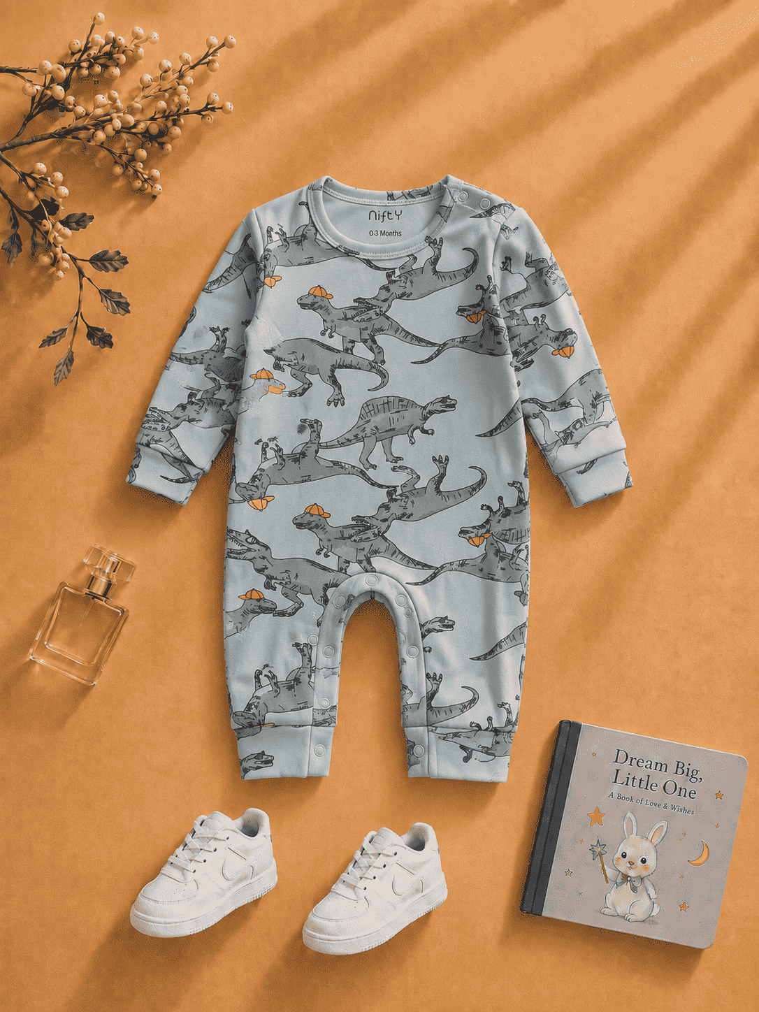 Grey blue baby romper with dinosaur print