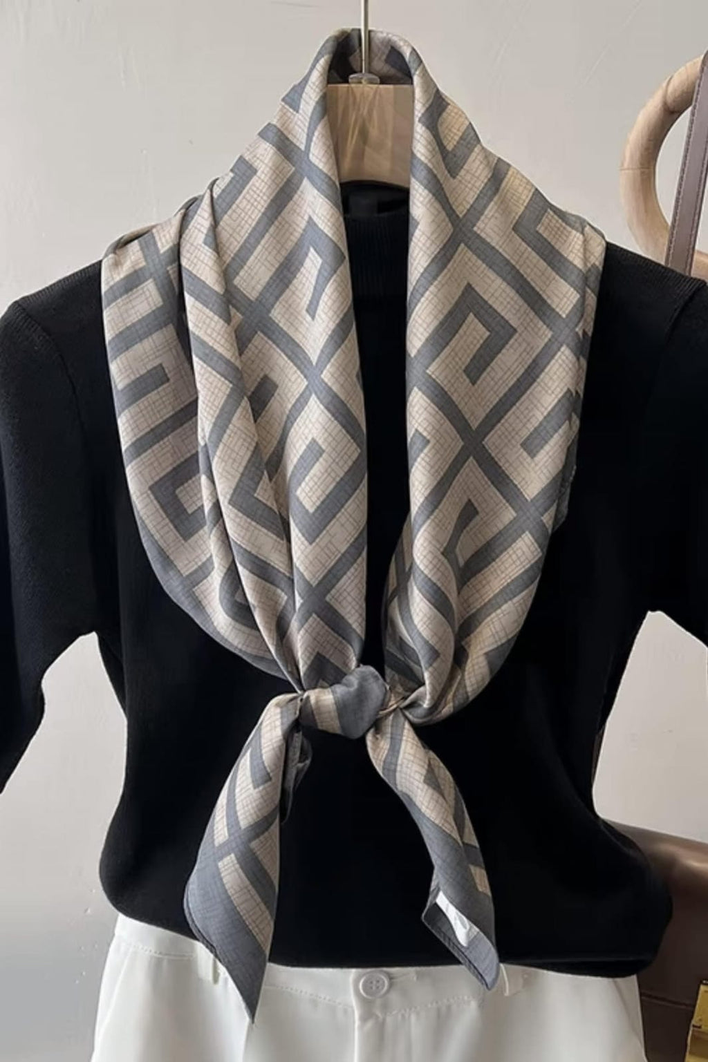 Slate blue and cream silk-satin scarf featuring a repeating interlocking Greek key geometric pattern