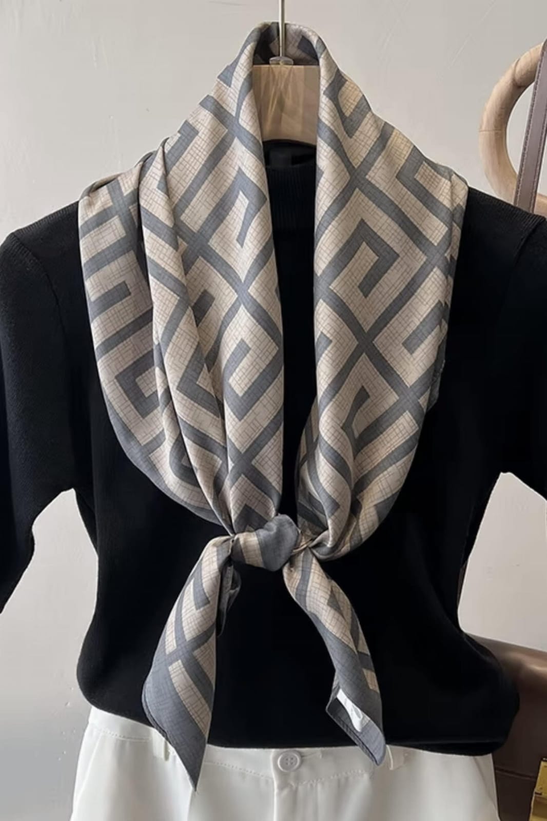 Slate blue and cream silk-satin scarf featuring a repeating interlocking Greek key geometric pattern