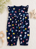 Baby girl navy blue sleeveless romper with multi-colored scattered hearts print and flutter sleeves.