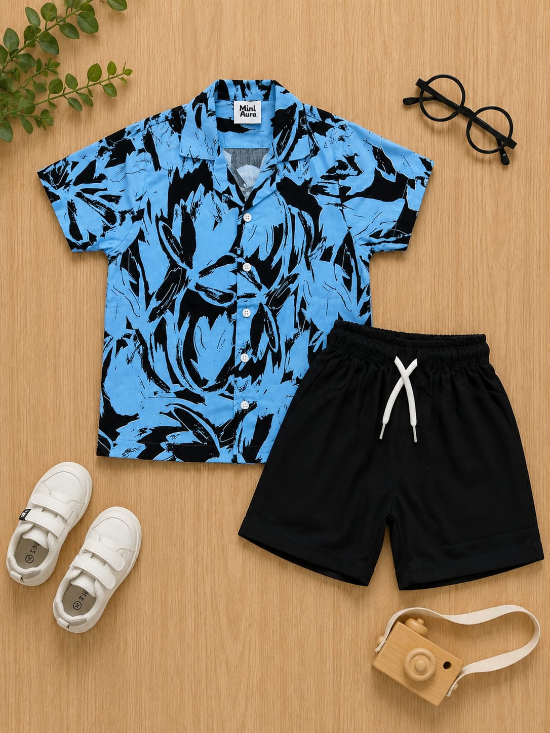 Boys light blue and black abstract paint brush stroke print short-sleeve button-down shirt with black shorts set.